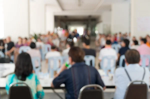 Reunión fondo borroso en la sala de conferencias brillante — Foto de Stock