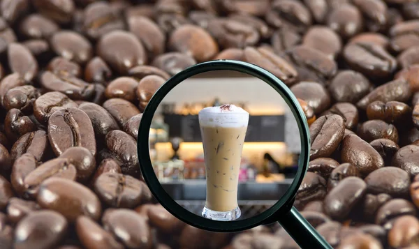 magnifying glass with background of roasted coffee beans to be coffee cup, food and drink with business concept