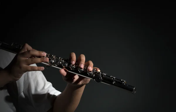 Hand hitting the Thai musical instrument (xylophone),asian instrument, focus on hand