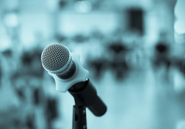 Close up of microphone in conference room on blurred background — Stock Photo, Image