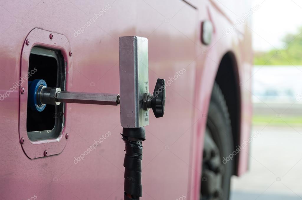 Gas nozzle to add gas in car at gas station