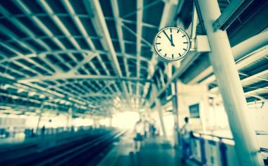 Clock at the sky-train station,vintage tone clipart