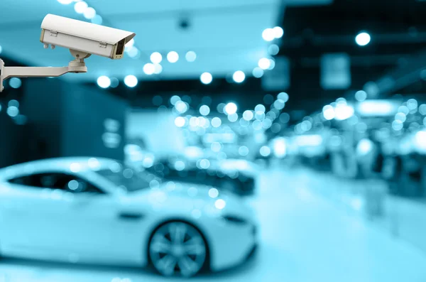 Cctv Überwachungskamera auf dem Monitor das abstrakte verschwommene Foto der Autoshow, Auto-Show-Raum, Farbton verwischen — Stockfoto