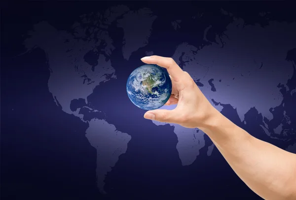 Man hand catching the earth on world map,Elements of this image furnished by NASA — Stock Photo, Image