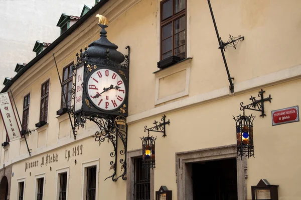 Brewery and restaurant with a clock in Prague — Stock Photo, Image