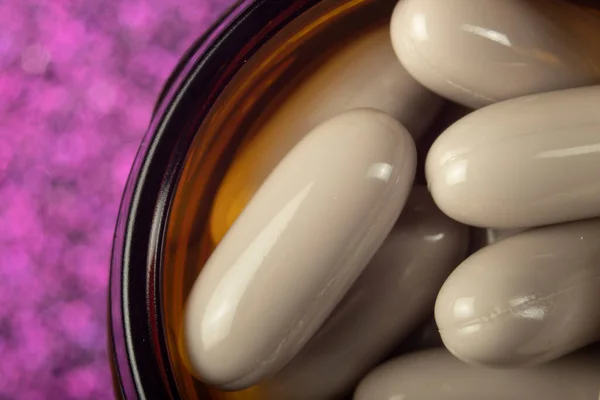 Very Close Macro Photo Detail Beige Pills Top Glass Jar — Stock Photo, Image