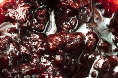 Açılan Jar.Macro Fotoğraf: Erik Reçeli Yüzeyi 'nin Üstü Marthe Yapısı.