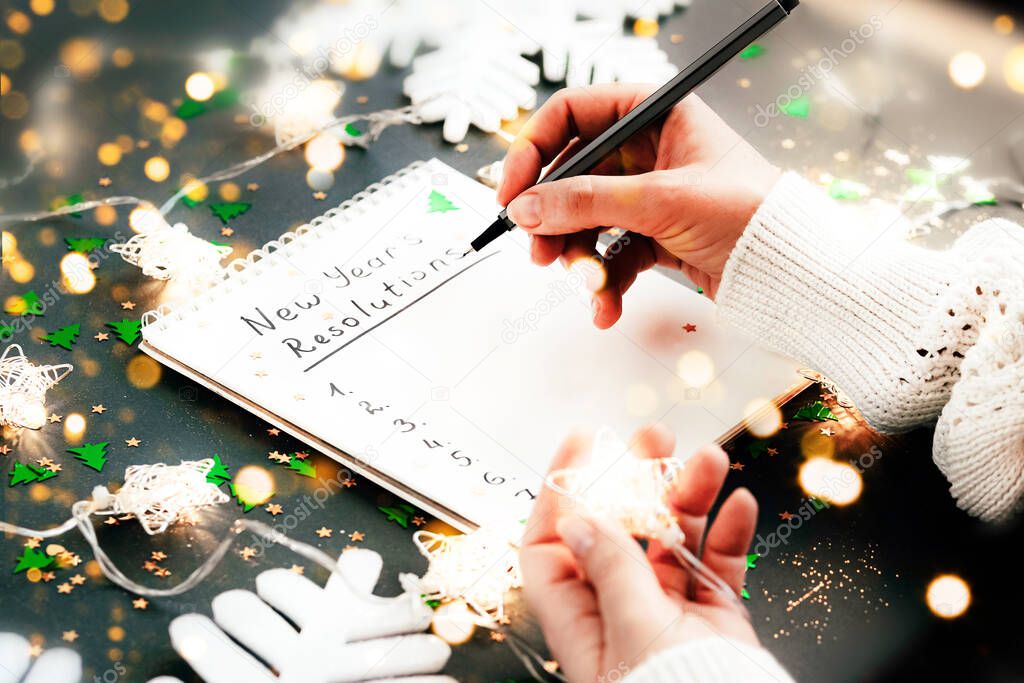 Hand writing New Year 2021 goals list