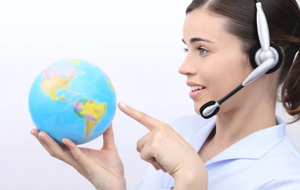 Customer service operator woman with headset pointing her finger — Stock Photo, Image