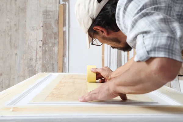 Male Carpenter Working Wood Carpentry Workshop Putting Paper Masking Tape — Stockfoto