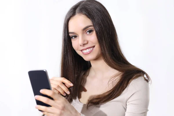 Young Woman Holding Smartphone Looking Camera Smiling White Background — Stock Photo, Image