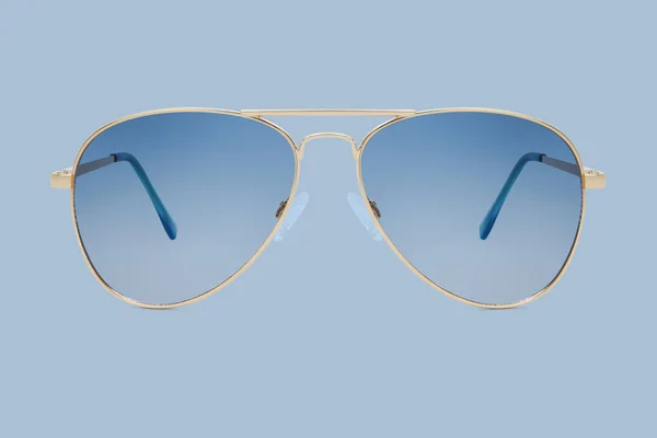 Sunglasses Golden Metallic Frame Blue Polarized Lenses Isolated Blue Background — Stock Photo, Image