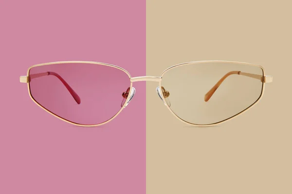 선글라스 뼈대와 베이지와 분홍빛 배경에 분리되어 — 스톡 사진