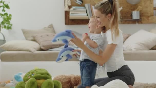 Happy Smiling Mom Baby Playing Living Room Home Plush Stuffed — Stock Video