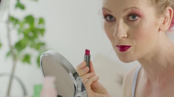 Portrait Blonde Woman Applying Red Lipstick Her Lips Holding Mirror — Stock Video