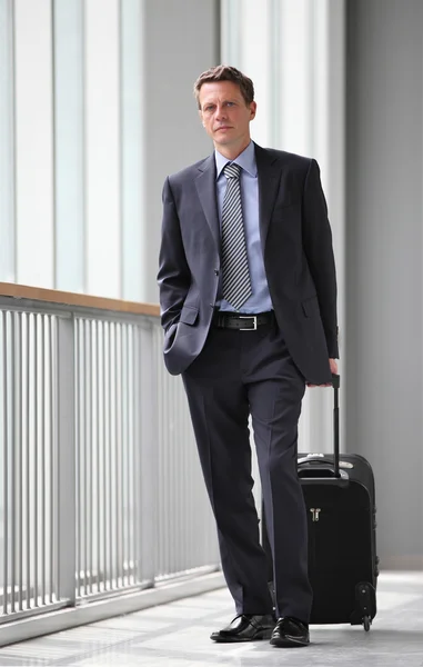 Businessman travel with trolley — Stock Photo, Image