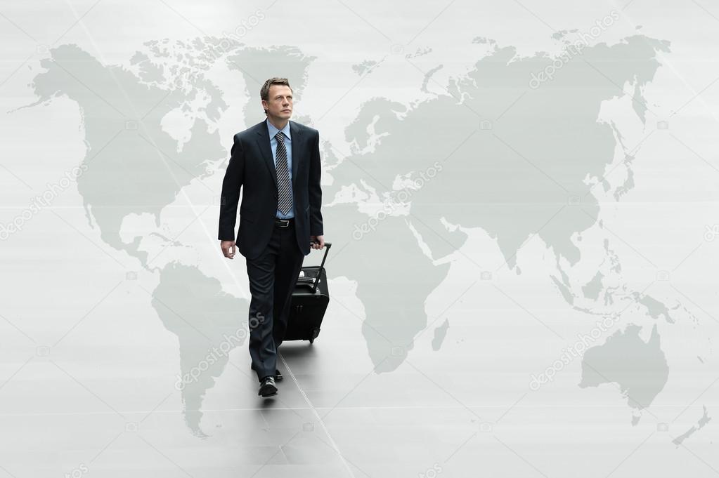 business man walking on the world map, international travel conc