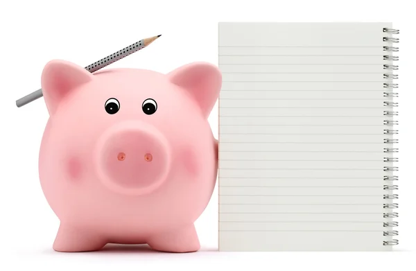 Piggy bank met werkboek en potlood op witte achtergrond — Stockfoto