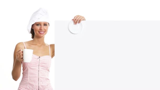 Chef woman with cup showing indicate white billboard, coffee, tea, chocolate marketing concept — Stock Video