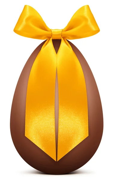 Œuf de Pâques en chocolat avec ruban doré — Photo
