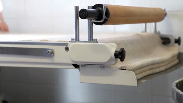 Machine that works the dough puff pastry — Stock Video