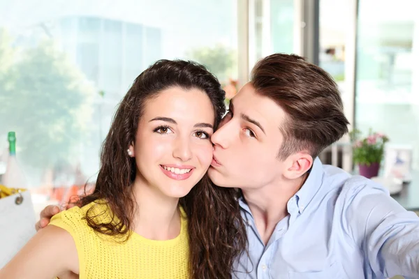 Smiling young couple who do a selfie — Stock Photo, Image