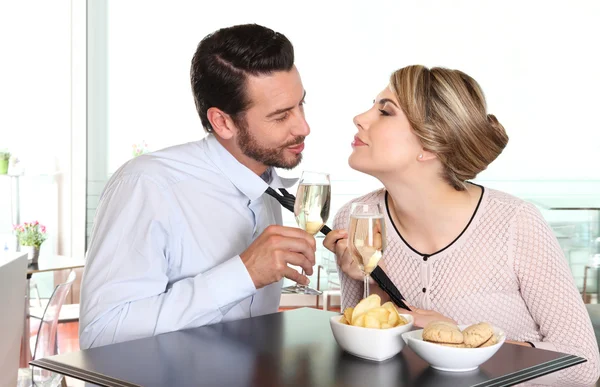 Woman pulling the tie to boyfriend, couple love concept — Stock Photo, Image