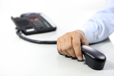 El ofis telefon üstünde okul sırası ile