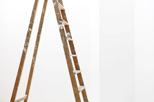 Painter wooden ladder,isolated on white, wall painting concept — Stock Photo, Image