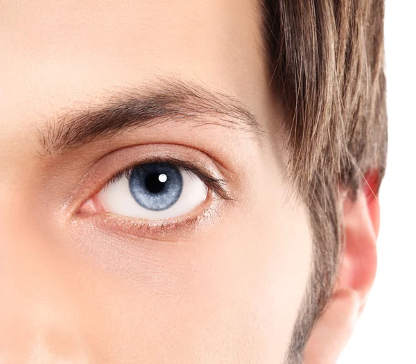 Half face Closeup of blue eyes from a young man — Stock Photo, Image