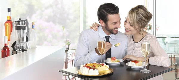 Happy couple date at the bar with wine and fruit cake, love conc — Stock Photo, Image