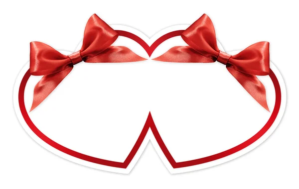 白い背景で隔離赤い弓と心の形 — ストック写真