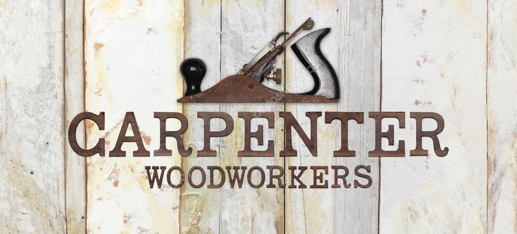 carpenter text with planer on wooden background