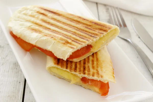 Toasted cheese and tomato panini — Stock Photo, Image