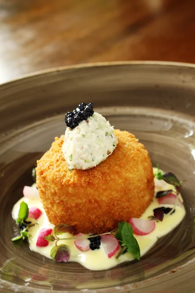 Gastronomische viskoekjes verguld maaltijd — Stockfoto