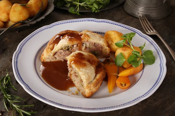 Pork wellington roast dinner — Stock Photo, Image