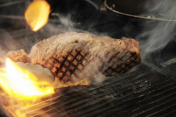 Steaks cooking on stove — Stock Photo, Image