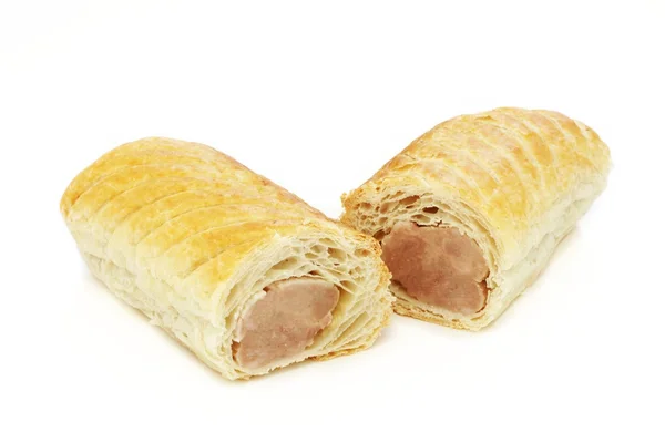 Rouleau de saucisse cuit au four — Photo