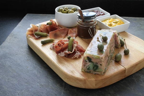 Charcuterie antipasto selection on board — Stock Photo, Image