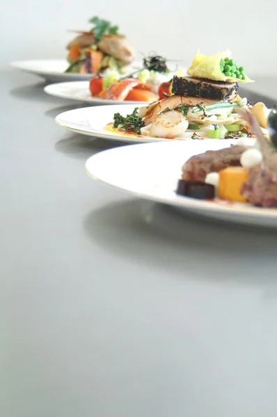 Plated meals ready for service — Stock Photo, Image