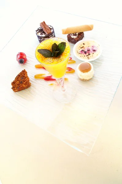 Sweet breakfast on glass plate — Stock Photo, Image