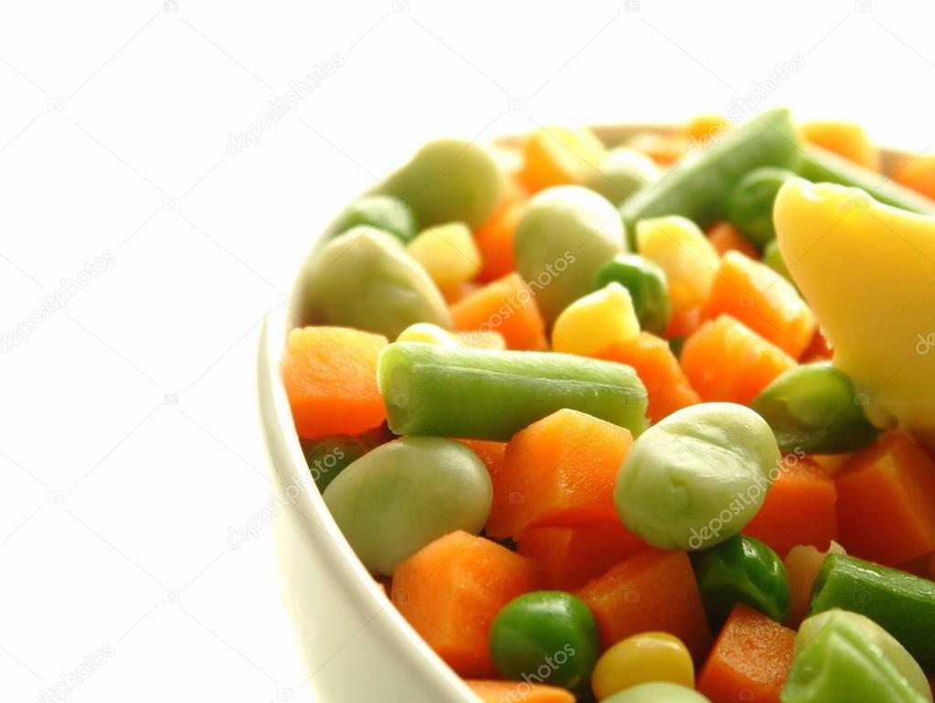 mixed frozen vegetables in white bowl