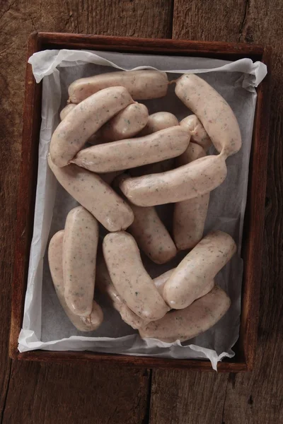 Uncooked linked British sausages — Stock Photo, Image