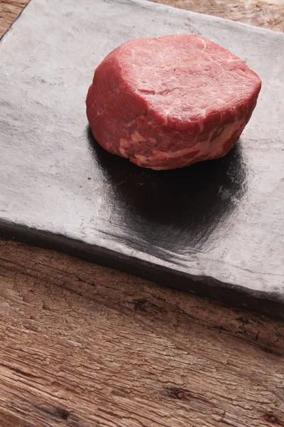 Steak dinner on wooden board — Stock Photo, Image