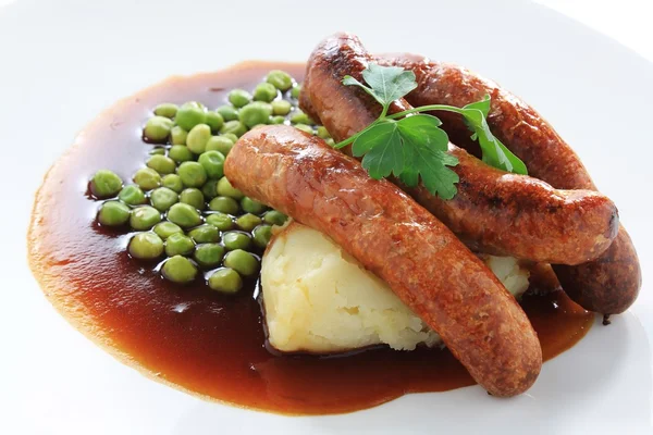 British sausages on plate — Stock Photo, Image