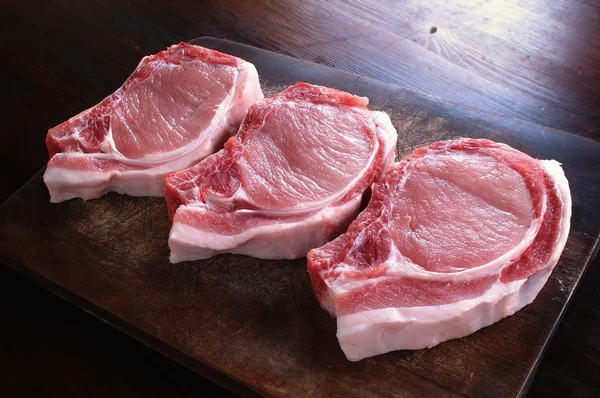 Uncooked pork rib chops — Stock Photo, Image