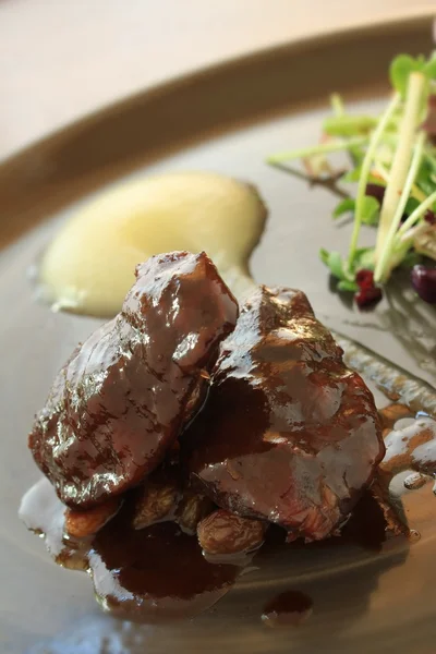 Plated pork dinner meal — Stock Photo, Image