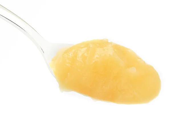 Lemon curd in spoon — Stock Photo, Image