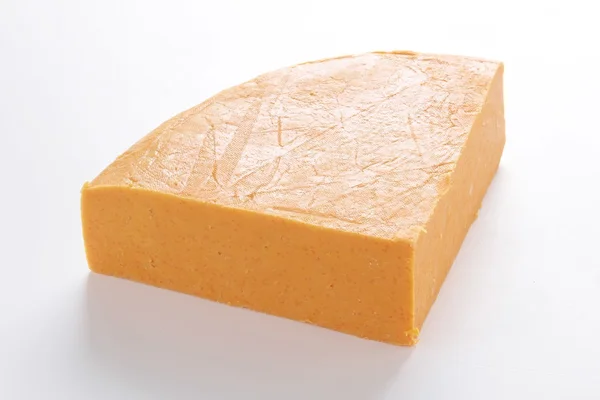 Große Scheibe Käse — Stockfoto