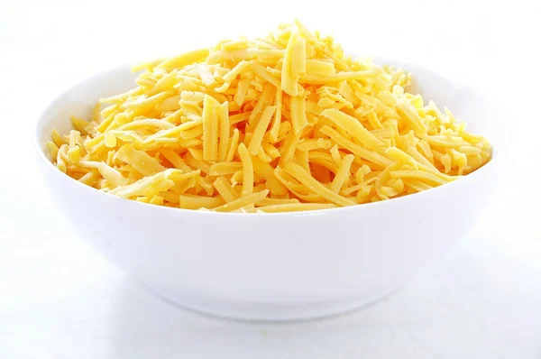 Fresh grated cheese — Stock Photo, Image